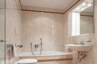 Large bathroom with shower and bathtub
